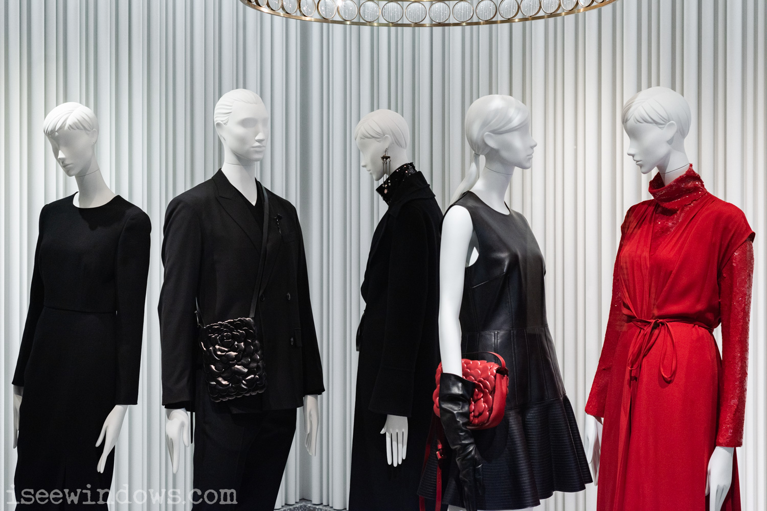 visual merchandising window display mannequins luxury retail Valentino